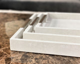 One Preevay Luxury Home Furnishings & Decor, The Perfect Blend of Style and Serenity.
Unlock Exclusive Savings! Get 25% off when you bundle ALL Three Sizes of the Thursby Shagreen Hotel Tray Together. A $377.00 value for just $282 | Plus Free Shipping!
Thursby Luxury Shagreen Serving Tray | Exotic Embossed Leather Nickel Hardware;
17" x 10" (Perfect for small gatherings and intimate settings)
20" x 13" (Ideal for larger gatherings and special occasions)
23" x 15..