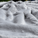 Experience luxurious relaxation with One Preevay's world's first weighted faux rabbit fur blanket, inspired by Fernando Botero. Clinically developed, 20lbs, hypoallergenic, and luxurious for serene sleep & relaxation always...