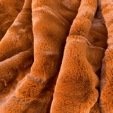 Experience luxury redefined with ONE Preevay's Faux Rabbit Fur Throw in Coco Brown. Inspired by Fernando Botero and crafted from Ultra Premium Faux Rabbit Fur. Hypoallergenic, cruelty-free, and lined with elegant velvet for refined warmth and sophistication. 800gsm, 50x60 inches.