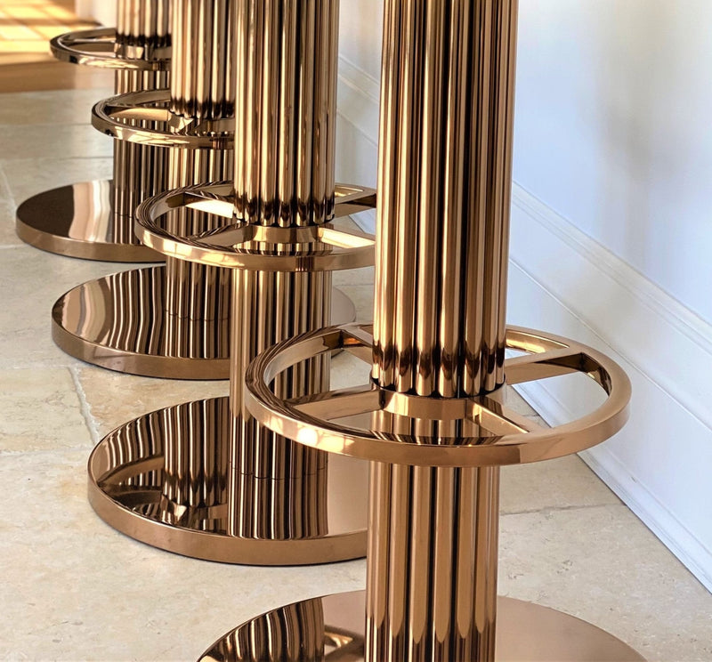 Atlas luxury Art Deco bar stool with custom bronze finish and premium velvet upholstery, showing Chrysler Building inspired design details..........