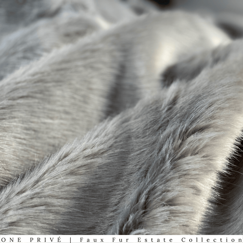  Elevate your space with One Preevay's Breakfast at Tiffany's Inspired Sable Faux Fur Throw - ultra-soft, 950gsm, silver gray, and 50x60 inches. Timeless elegance meets comfort in One Preevay Luxury