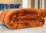 Experience luxury redefined with ONE Preevay's Faux Rabbit Fur Throw in Coco Brown. Inspired by Fernando Botero and crafted from Ultra Premium Faux Rabbit Fur. Hypoallergenic, cruelty-free, and lined with elegant velvet for refined warmth and sophistication. 800gsm, 50x60 inches

