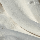 Indulge in the epitome of luxury with the One Preevay Faux Rabbit Fur Throw in Pure White. Inspired by the elegance of Fernando Botero and crafted from ultra-premium faux rabbit fur. Hypoallergenic, cruelty-free, and lined with elegant velvet for refined warmth and sophistication. 800gsm, 50x60 inches...
