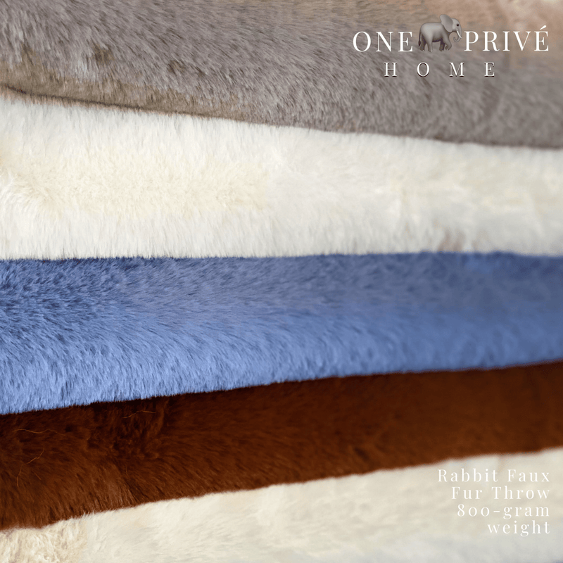 Indulge in the epitome of luxury with the One Preevay Faux Rabbit Fur Throw in Yacht Blue. Inspired by the elegance of Fernando Botero and crafted from ultra-premium faux rabbit fur. Hypoallergenic, cruelty-free, and lined with elegant velvet for refined warmth and sophistication. 800gsm, 50x60 inches and plush 