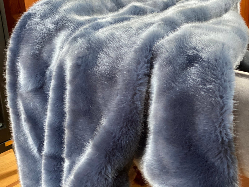 "Indulge in timeless luxury with One Preevay's Breakfast at Tiffany's Inspired Sable Faux Fur Throw. Ultra-soft, 950gsm, midnight blue, 50x60". Tribute to Audrey Hepburn's iconic style, hypoallergenic, durable.