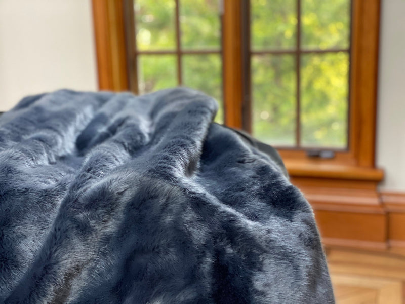 "Indulge in timeless luxury with One Preevay's Breakfast at Tiffany's Inspired Sable Faux Fur Throw. Ultra-soft, 950gsm, midnight blue, 50x60". Tribute to Audrey Hepburn's iconic style, hypoallergenic, durable and beautiful.