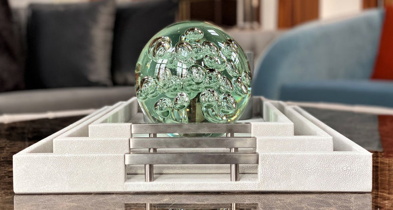 Discover the Thursby Shagreen Hotel Tray from One Preevay—a luxurious serving tray crafted with exotic embossed leather and nickel hardware. Available in three sizes: 17"x10", 20"x13", and 23"x15". Elevate your entertaining experience with sophistication and style. Order now.......
