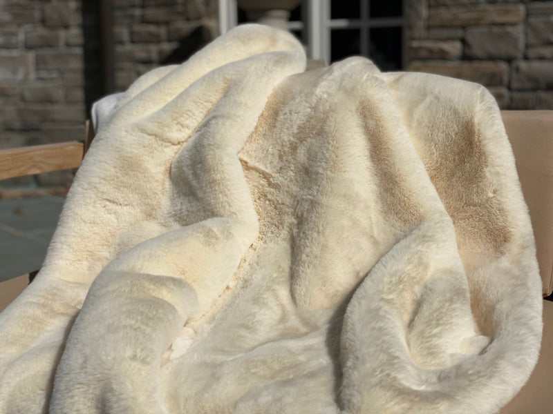 The Experience luxury with ONE Preevay's Rabbit Faux Fur Throw. Inspired by Fernando Botero, crafted from Ultra Premium Rabbit Faux Fur. 800 gsm, 50x60 inches in Casual Khaki. Hypoallergenic and elegant.">
