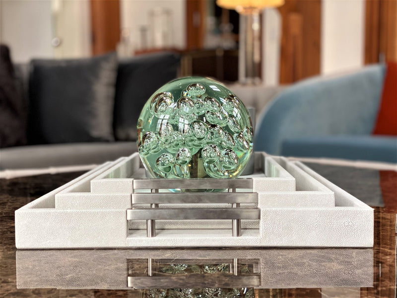 Discover the Thursby Shagreen Hotel Tray from One Preevay—a luxurious serving tray crafted with exotic embossed leather and nickel hardware. Available in three sizes: 17"x10", 20"x13", and 23"x15". Elevate your entertaining experience with sophistication and style. Order now...
