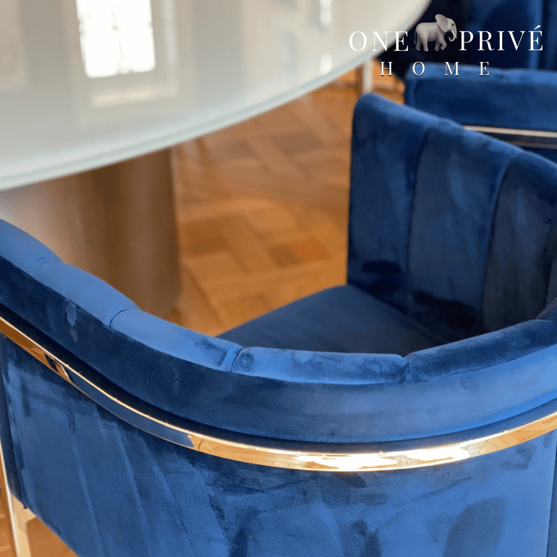 Discover_the_One_Preevay_Arc_Dining_Chair._Inspired_by_the_Arc_de_Triomphe_this_customizable_luxury_chair_features_a_nickel_frame_and_plush_velvet._Perfect_for_upscale_residences_and_hospitality_venues blue velvet 