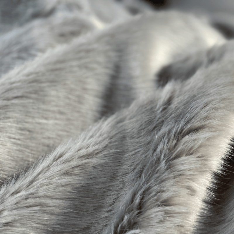 Indulge in the ultimate luxury with the One Preevay Silver Gray Sable Faux Fur Throw. Crafted from ultra-soft faux sable fur and lined with elegant velvet, this 950gsm, hypoallergenic throw is designed to provide warmth and sophistication. Perfect for adding a touch of elegance to any room. 50x60.
 Elevate your space with One Preevay's Breakfast at Tiffany's Inspired Sable Faux Fur Throw - ultra-soft, 950gsm, silver gray, and 50x60 inches. Timeless elegance meets comfort in One Preevay's Breakfast at Tiffan