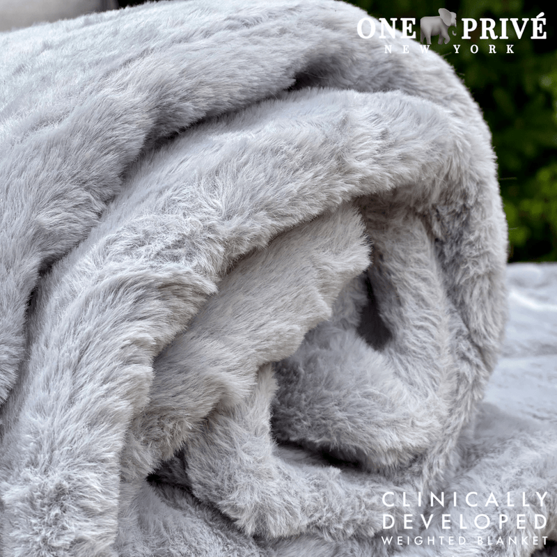 Experience luxurious relaxation with One Preevay's world's first weighted faux rabbit fur blanket, inspired by Fernando Botero. Clinically developed, 20lbs, hypoallergenic, and luxurious for...