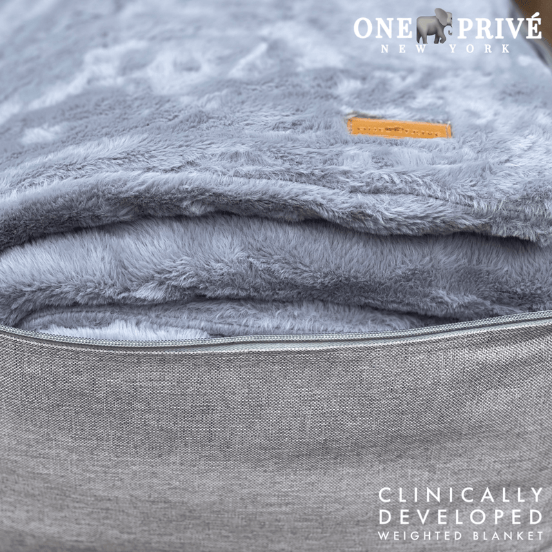 Experience luxurious relaxation with One Preevay's world's first weighted faux rabbit fur blanket, inspired by Fernando Botero. Clinically developed, 20lbs, hypoallergenic, and luxurious for serene sleep & relaxation.....