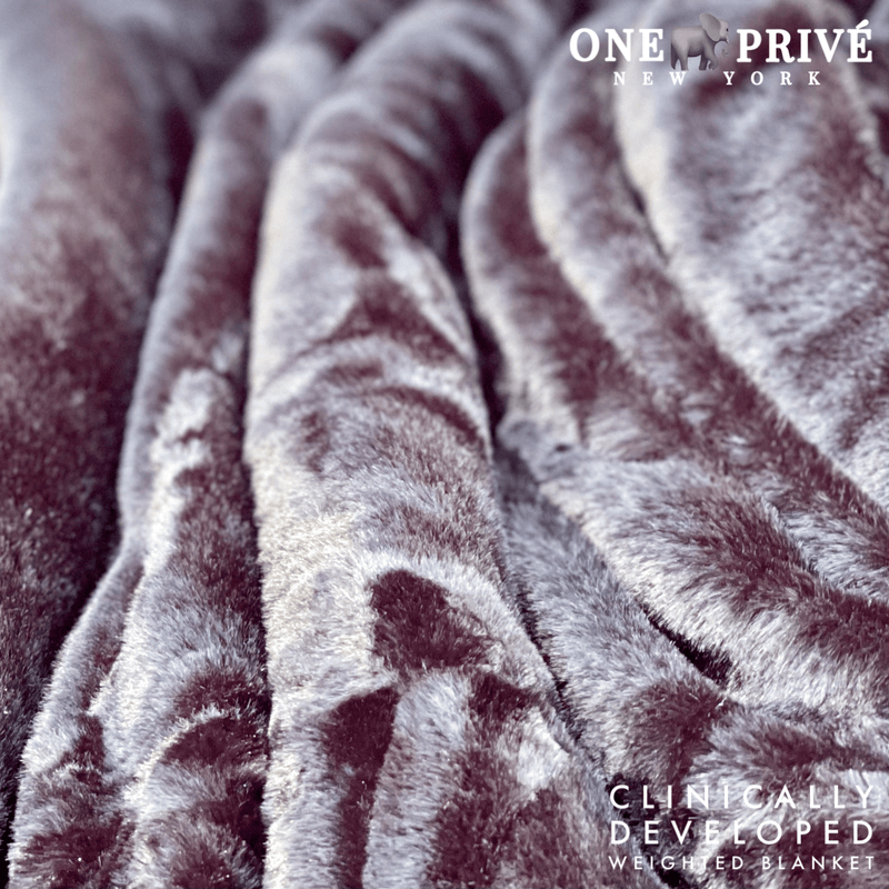 Experience luxurious relaxation with the One Preevay Luxury Home Furnishings, world's first weighted faux rabbit fur blanket, inspired by Fernando Botero. Clinically developed, 20lbs, queen size, and hypoallergenic. Exceptional Value //