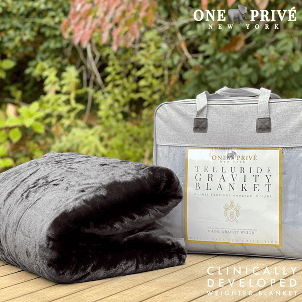 Experience luxurious relaxation with the One Preevay Luxury Home Furnishings, world's first weighted faux rabbit fur blanket, inspired by Fernando Botero. Clinically developed, 20lbs, queen size, and hypoallergenic. Perfect for a serene sleep and in black