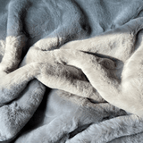 Experience luxury redefined with ONE Preevay's Faux Rabbit Fur Throw in Dramatic Gray. Inspired by Fernando Botero, crafted from Ultra Premium Faux Rabbit Fur. Hypoallergenic, cruelty-free, and lined with elegant velvet for refined warmth and sophistication. 800gsm, 50x60 inches.
