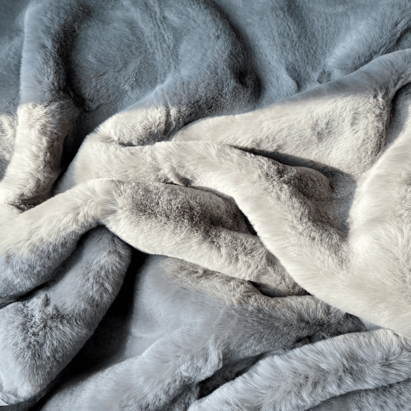 Experience luxury redefined with ONE Preevay's Faux Rabbit Fur Throw in Dramatic Gray. Inspired by Fernando Botero, crafted from Ultra Premium Faux Rabbit Fur. Hypoallergenic, cruelty-free, and lined with elegant velvet for refined warmth and sophistication. 800gsm, 50x60 inches.
