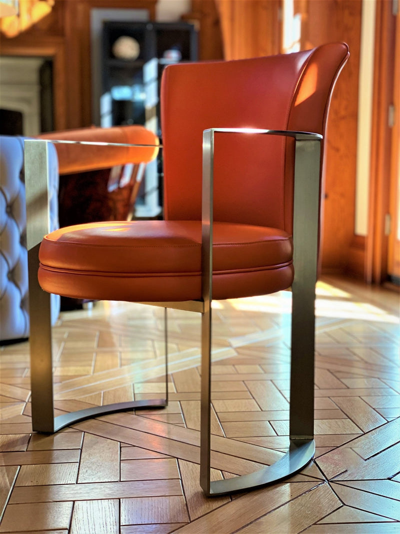 Experience luxury with One Preevay's Chatham Dining Chair ($12,800 Set of 4). Handcrafted in premium bronze & luxurious leathers, inspired by Kent Docks' rich history. Bespoke customization.