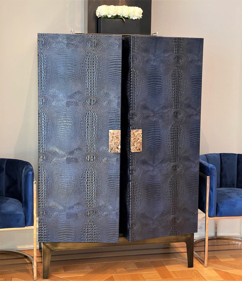 Experience ultra-luxury with One Preevay's bespoke Crocodile Armoire. Inspired by Louis XIV, this customizable piece combines elegance & functionality. Handcrafted with faux crocodile leather, ebony wood & marble