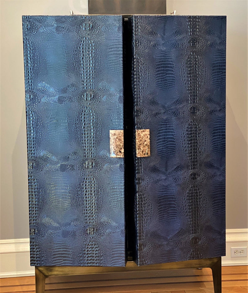 Experience ultra-luxury with One Preevay's bespoke Crocodile Armoire. Inspired by Louis XIV, this customizable piece combines elegance & functionality. Handcrafted with faux crocodile leather, ebony wood & marble handles. 