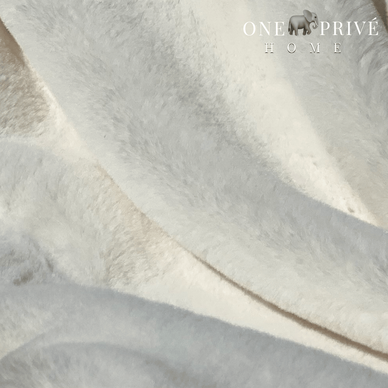 Indulge in the epitome of luxury with the One Preevay Faux Rabbit Fur Throw in Pure White. Inspired by the elegance of Fernando Botero and crafted from ultra-premium faux rabbit fur. Hypoallergenic, cruelty-free, and lined with elegant velvet for refined warmth and sophistication. 800gsm, 50x60 inches.....
