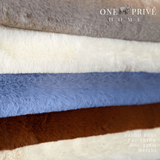 Indulge in the epitome of luxury with the One Preevay Faux Rabbit Fur Throw in Yacht Blue. Inspired by the elegance of Fernando Botero and crafted from ultra-premium faux rabbit fur. Hypoallergenic, cruelty-free, and lined with elegant velvet for refined warmth and sophistication. 800gsm, 50x60 inch