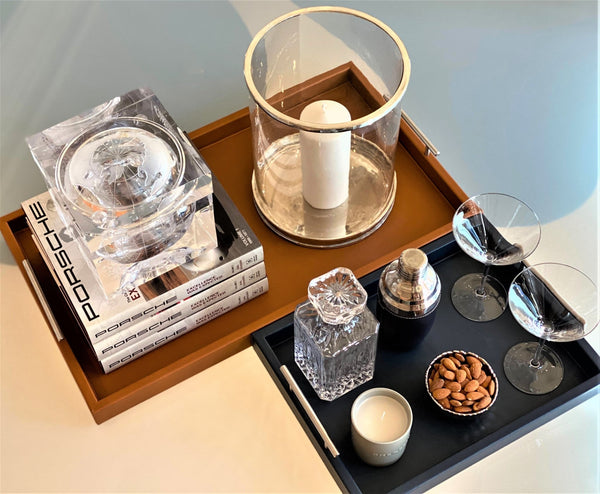 Porsche-Style Pierre Carmel Leather Tray | Handcrafted Premium Leather | Nickel Hardware. Limited Edition.&nbsp;

Elevate Your Entertaining Experience

Inspired by the iconic designs of Porsche, the Pierre Porsche-Inspired Carmel Leather Hotel Tray embodies the perfect blend of style and serenity. This exquisite piece features: two 