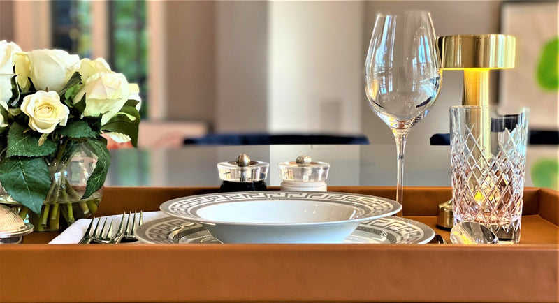 Elevate Your Entertaining Experience

Inspired by the iconic designs of Porsche, the Pierre Porsche-Inspired Carmel Leather Hotel Tray embodies the perfect blend of style and serenity. serving 